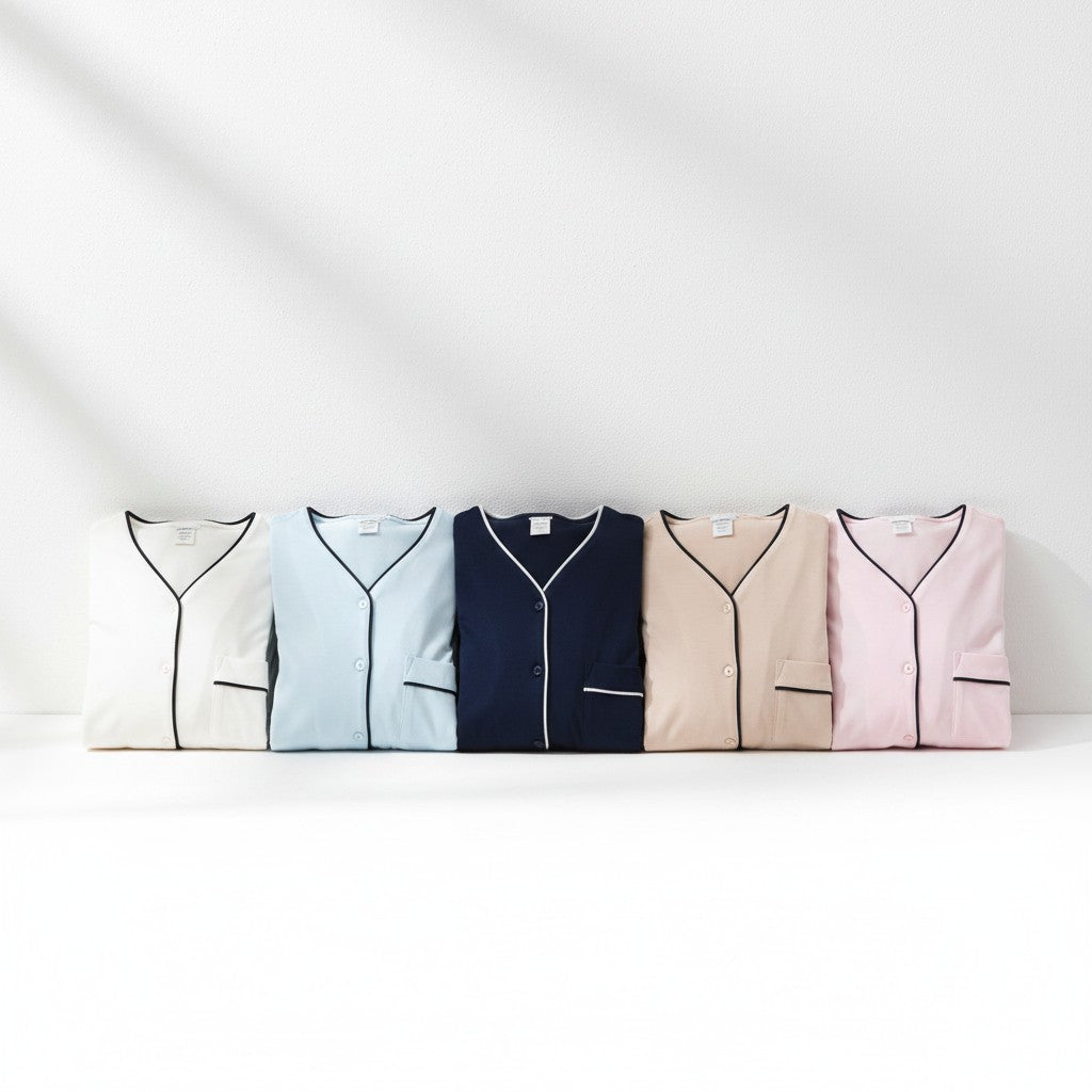 Pink maternity pyjamas by Mini Plum – long-sleeve with contrast piping, side view