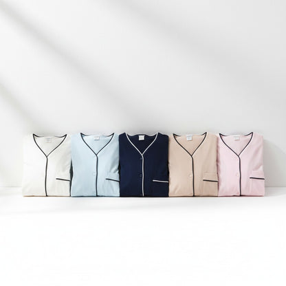 Pink maternity pyjamas by Mini Plum – long-sleeve with contrast piping, side view